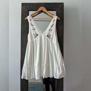 White with floral embroidery